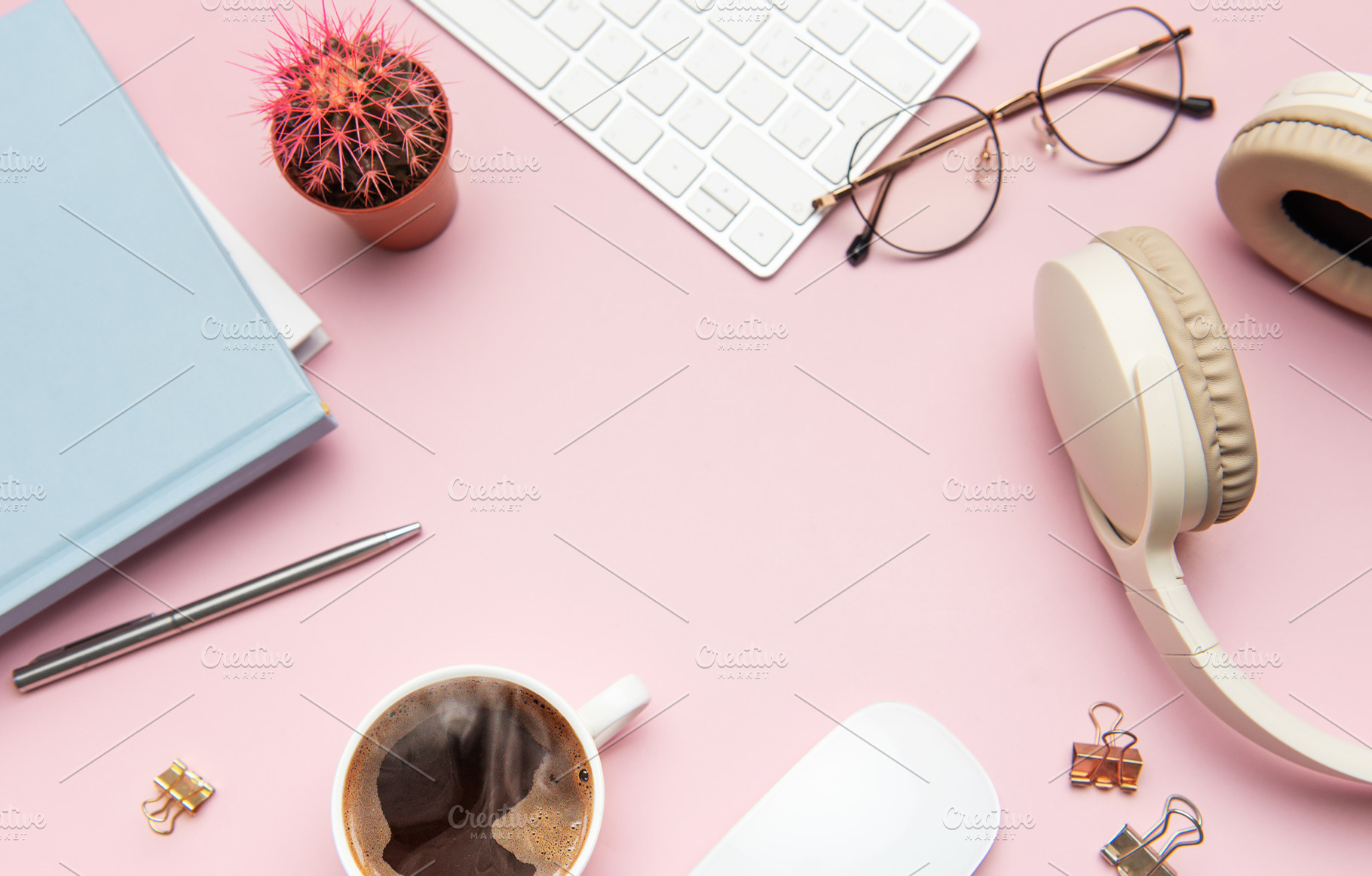 Pastel pink desk with coffee, headphones, and office supplies fr, a Business Photo by Olena Rudo