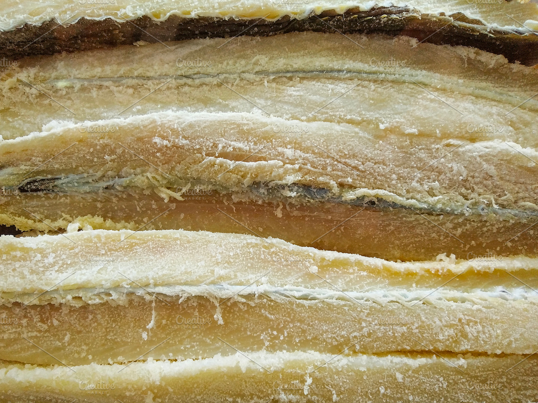 Frozen layers of salted cod fish, a Food & Drink Photo by DanFLCreativo