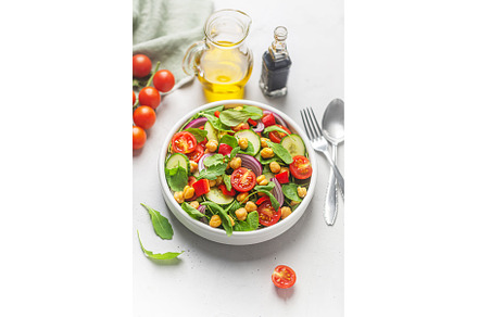 Vegetarian chickpea beans salad, a Food & Drink Photo by zakiroff