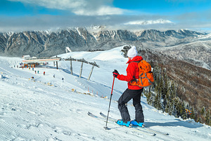 Wonderful ski resort with skiers, a Sports & Recreation Photo by Alpine Dreams