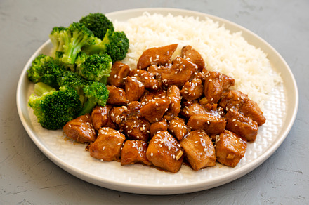 Homemade Teriyaki Chicken with Rice and Broccoli on a plate on a, a Food & Drink Photo by LiudmylaChuhunova