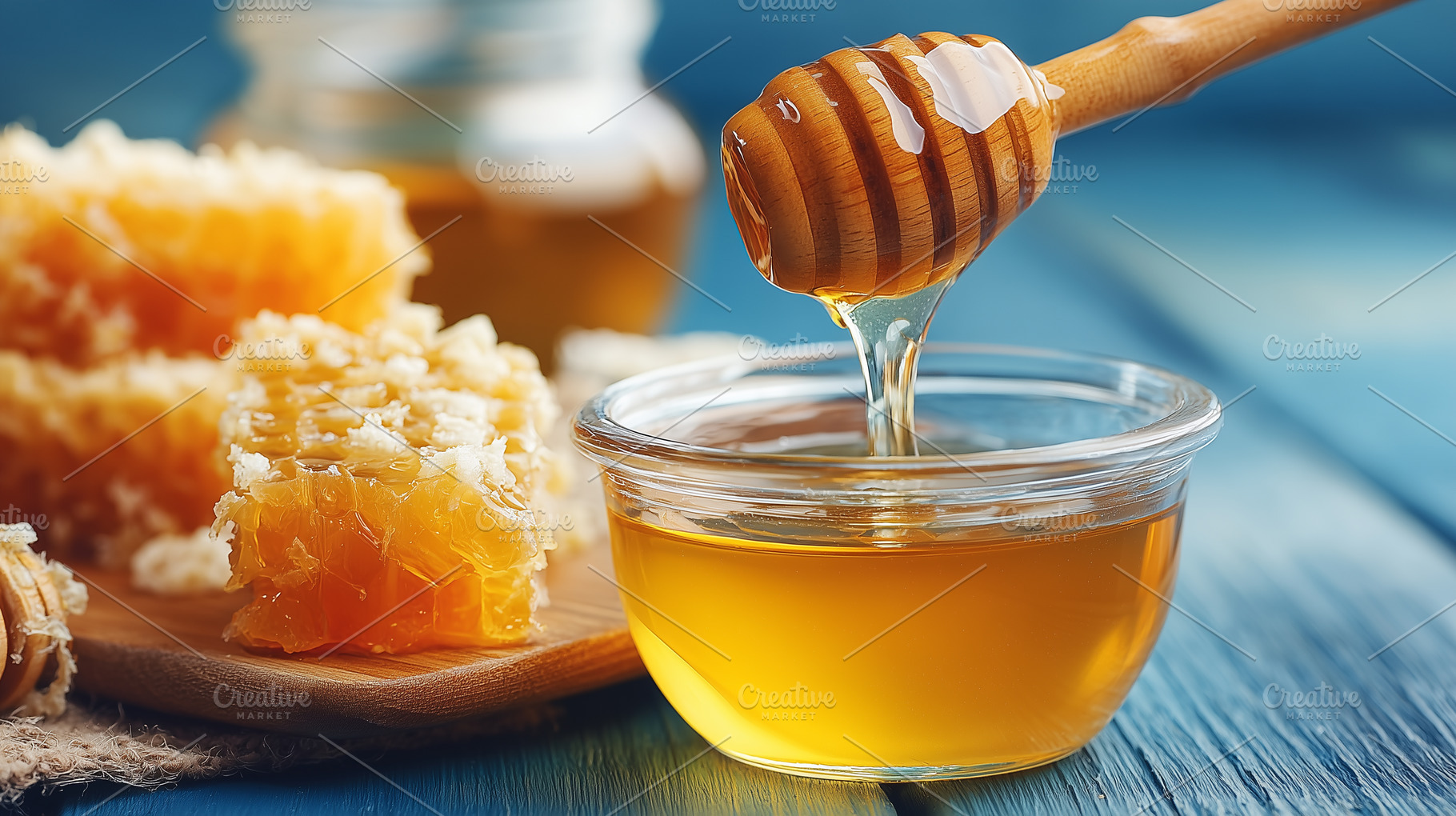 Fresh golden honey drizzled from, a Food & Drink Photo by MistyDay