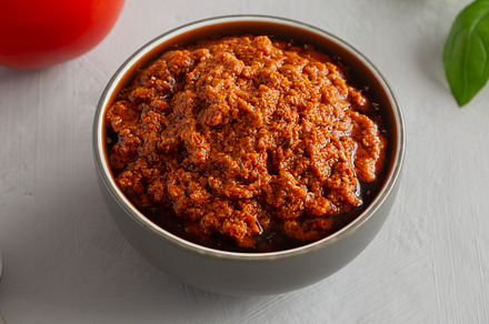 Homemade Sun Dried Tomato Pesto in a Bowl, side view., a Food & Drink Photo by LiudmylaChuhunova