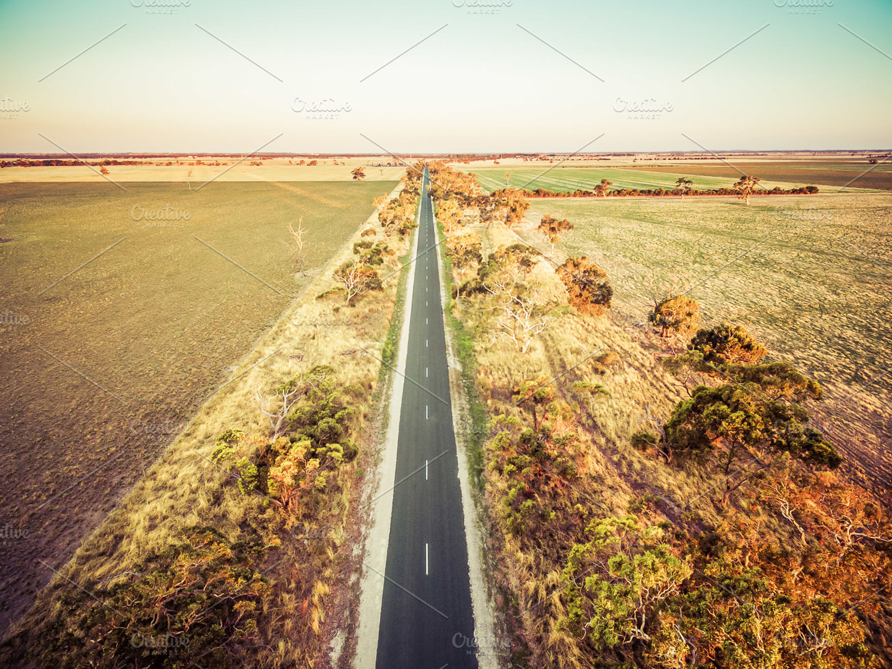 Straight road in rural area featuring dusk, landscape, and meadow, a Nature Photo by Australia Aerial Photo