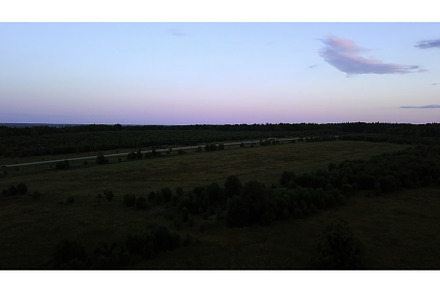 Aerial view and a sunset over meadow, a Nature Photo by Media Whale Stock