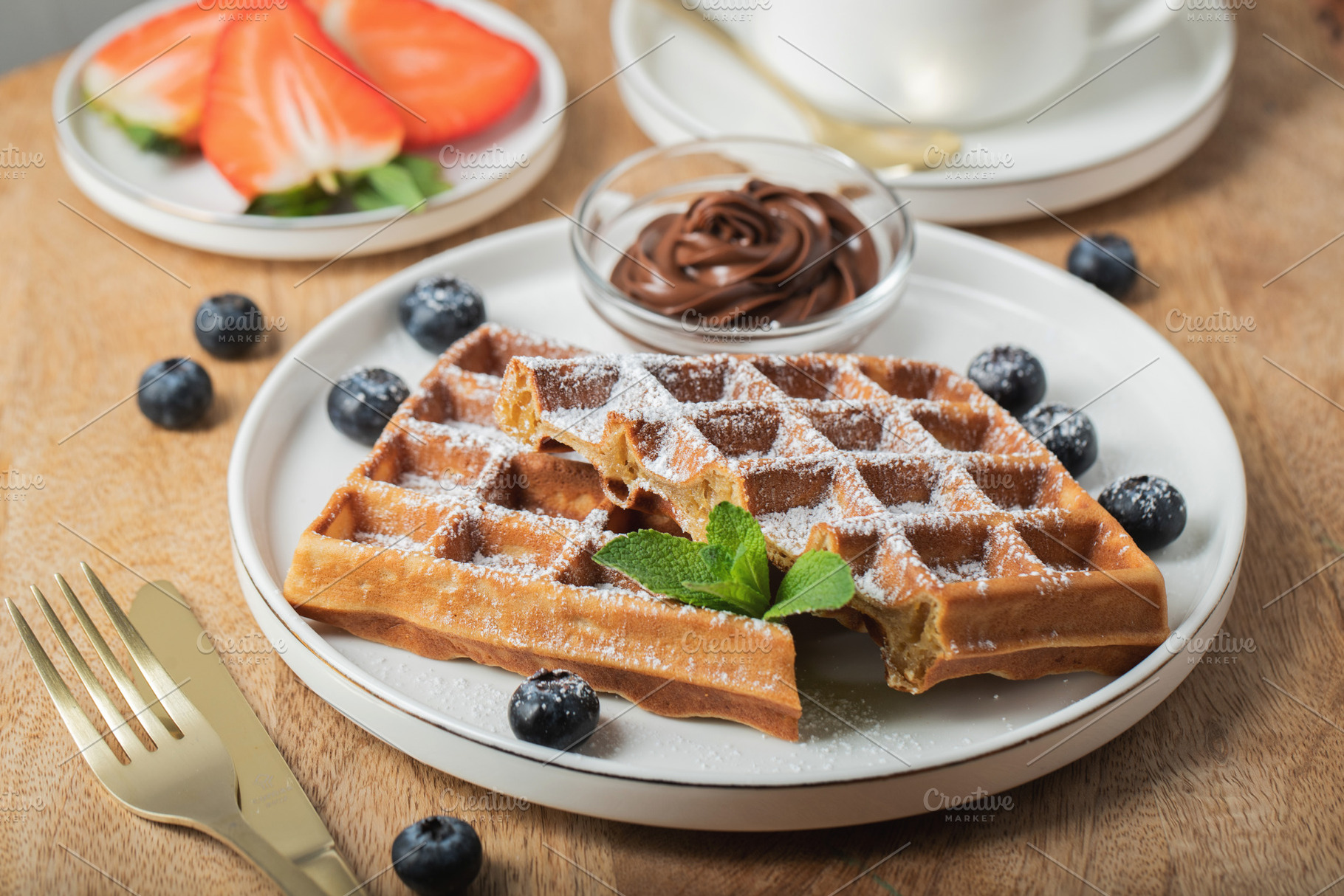 Belgium waffles Homemade waffles with strawberries, a Food & Drink Photo by Budarinphoto