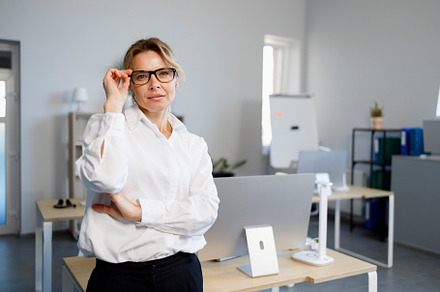 Confident mature business woman, a Person Photo by borodai94