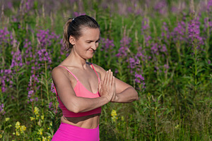 Woman in pink sportswear practicing, a Person Photo by Alexander-Piragis