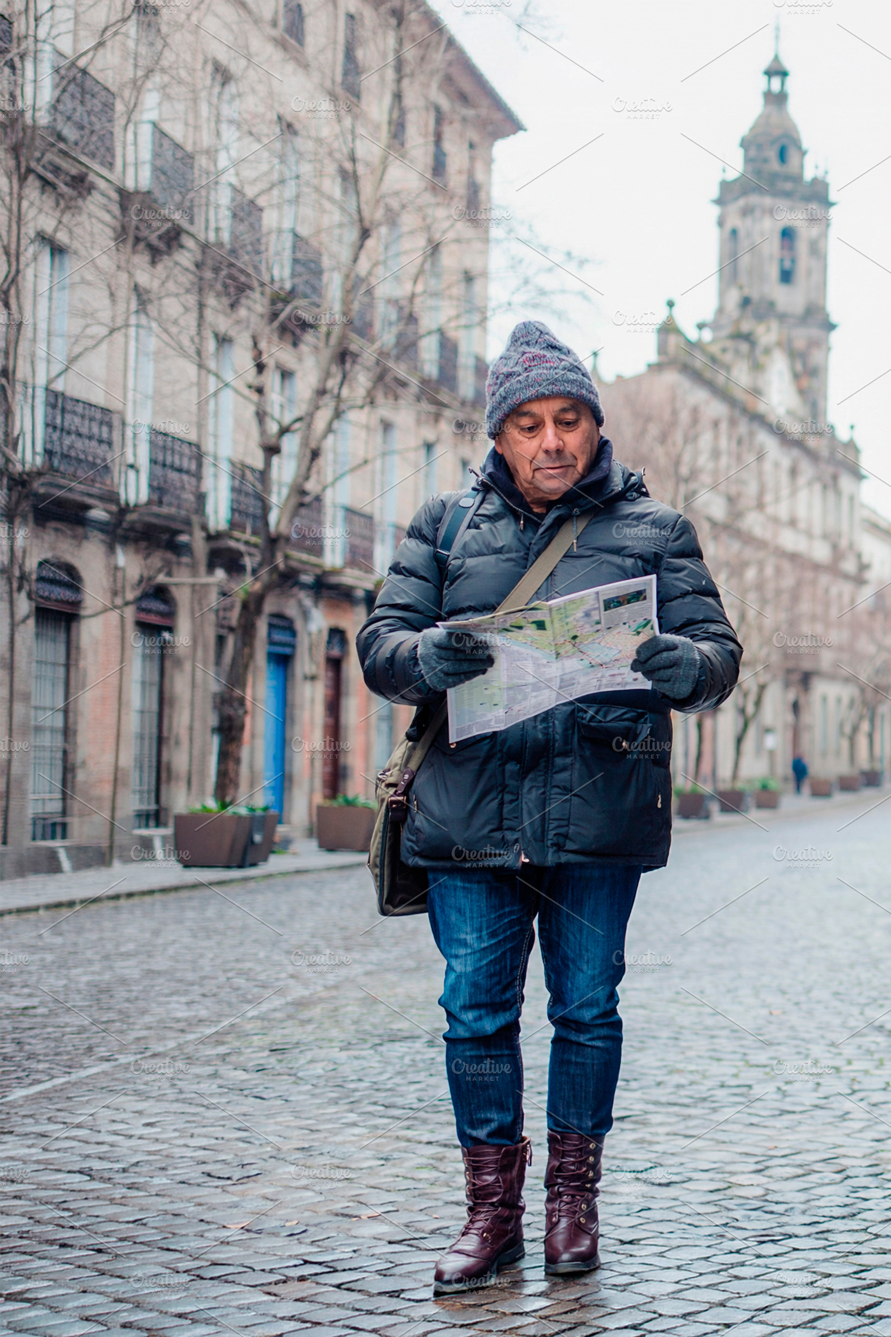 Mature men exploring a historic urban district in winter, a Person Photo by DanFLCreativo
