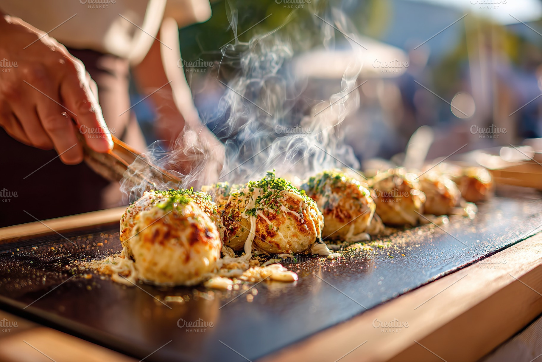Japanese takoyaki being expertly flipped at an outdoor food market in the after, a Food & Drink Photo by AlyaAnd