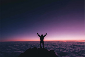 A tourist stands on a mountain slope, a Nature Photo by ZinetroN
