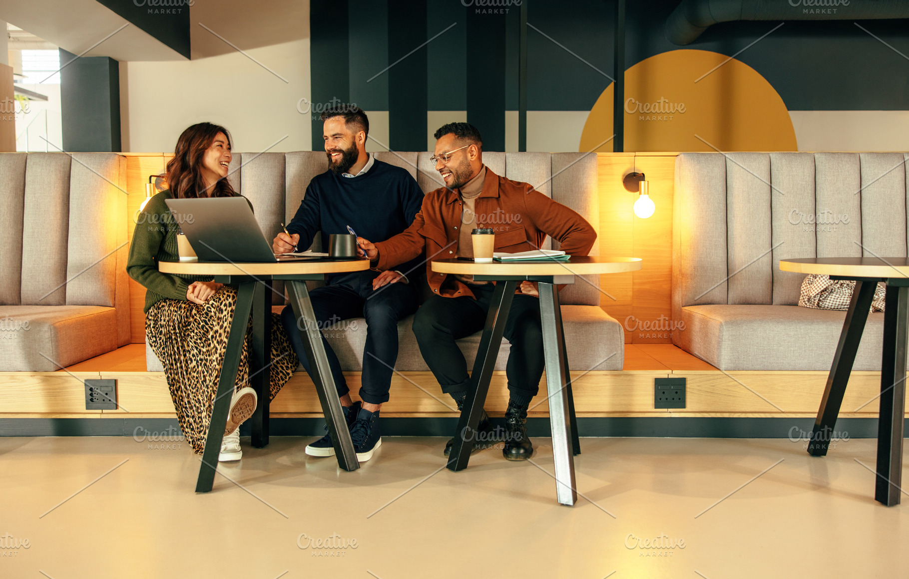 Modern entrepreneurs working together in a lobby, a Person Photo by Jacob Lund