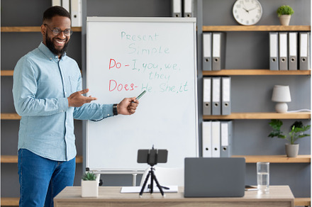 Cheerful millennial black guy, a School & Education Photo by Prostock-Studio