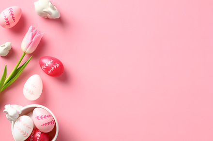 Happy Easter concept. Easter card with eggs, bunnies and tulips on a pink backg, a Holiday Photo by photoguns