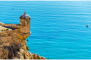 Watchtower of santa barbara castle in alicante spain featuring castle, tower, an Architecture Photo by Leonid Andronov