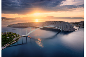 Aerial view of bridge and blue sea, an Architecture Photo by den-belitsky