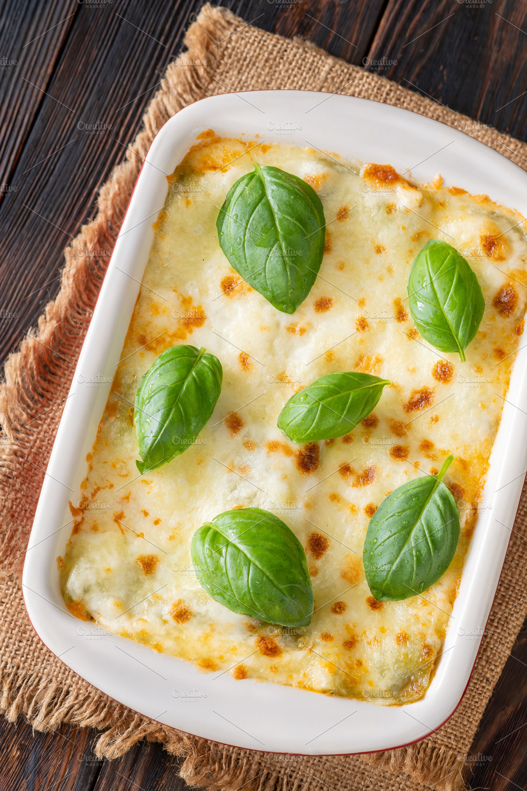 Rustic Lasagna Bolognese In Ceramic Baking Dish With Golden Chee, a Food & Drink Photo by Alexander Prokopenko