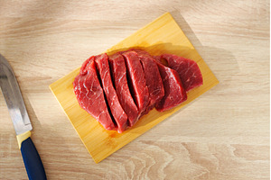 Freshly sliced red meat displayed on, a Food & Drink Photo by darksoul72