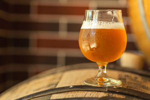 Light beer on a barrel stock photo containing alcohol and ale