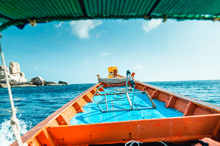 traveling on a long-tail boat on the bay at Koh Tao, a Transportation Photo by Art Rachen