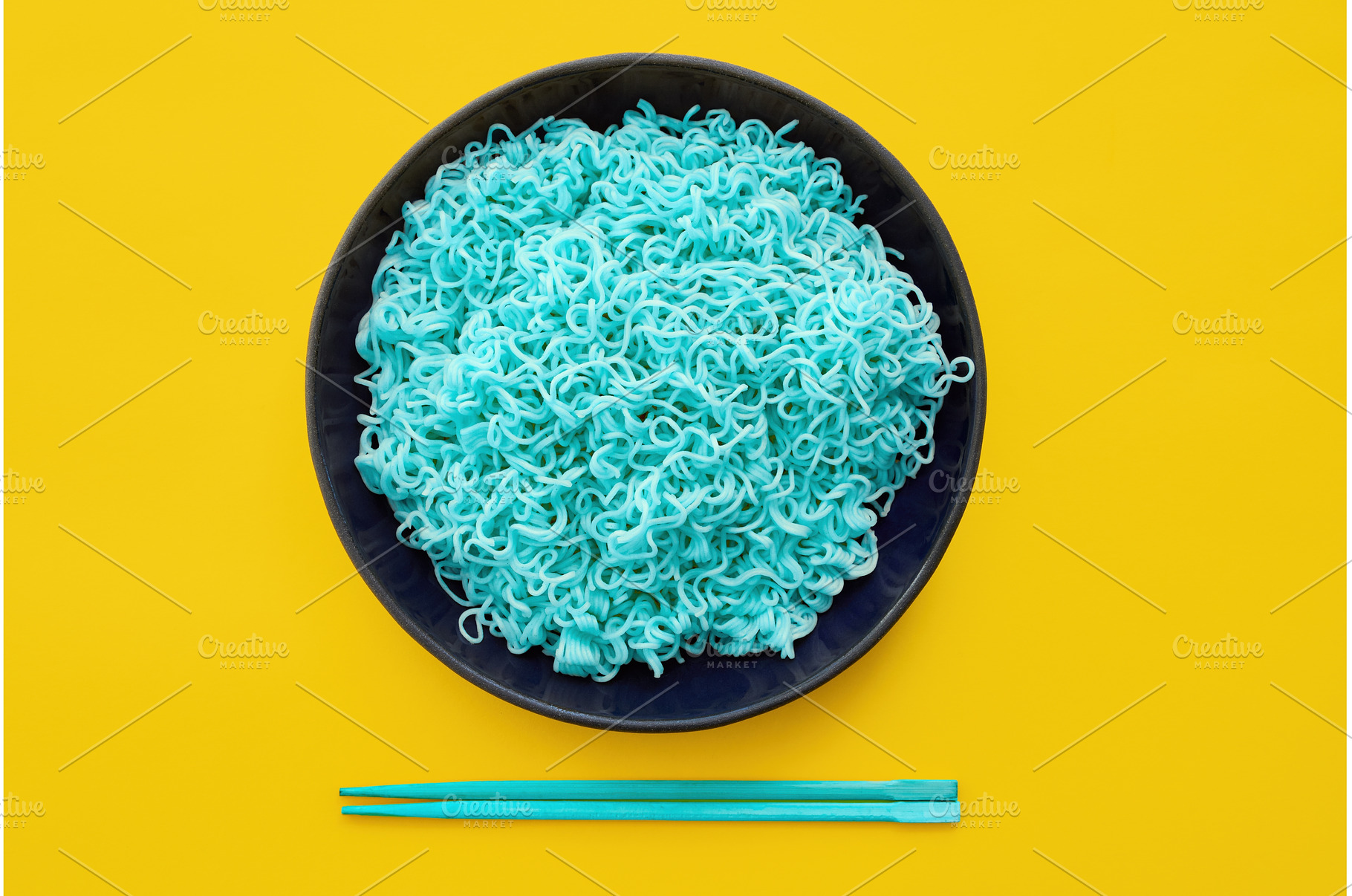 Bright blue noodles with chopsticks, a Food & Drink Photo by Gladkov photography