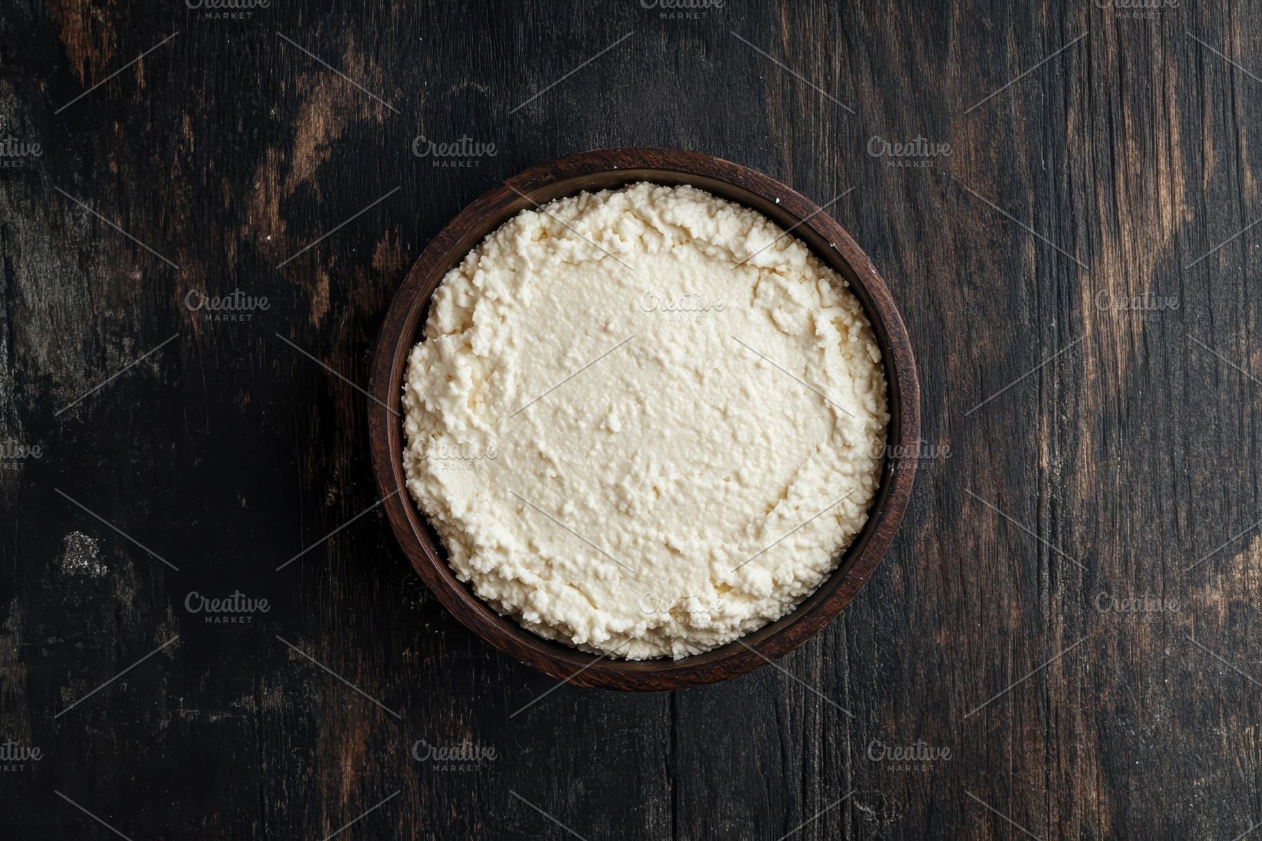 Creamy cottage cheese served in a ru, a Photo by Tanuart