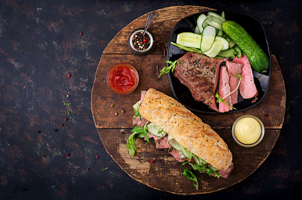 Sandwich with roast beef featuring closeup, roast, and meal