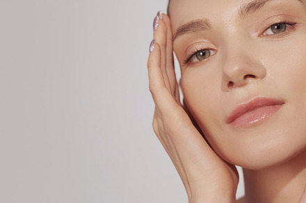 Skin moisturizing facial care woman touching face, a Beauty & Fashion Photo by Photo Drive Studio