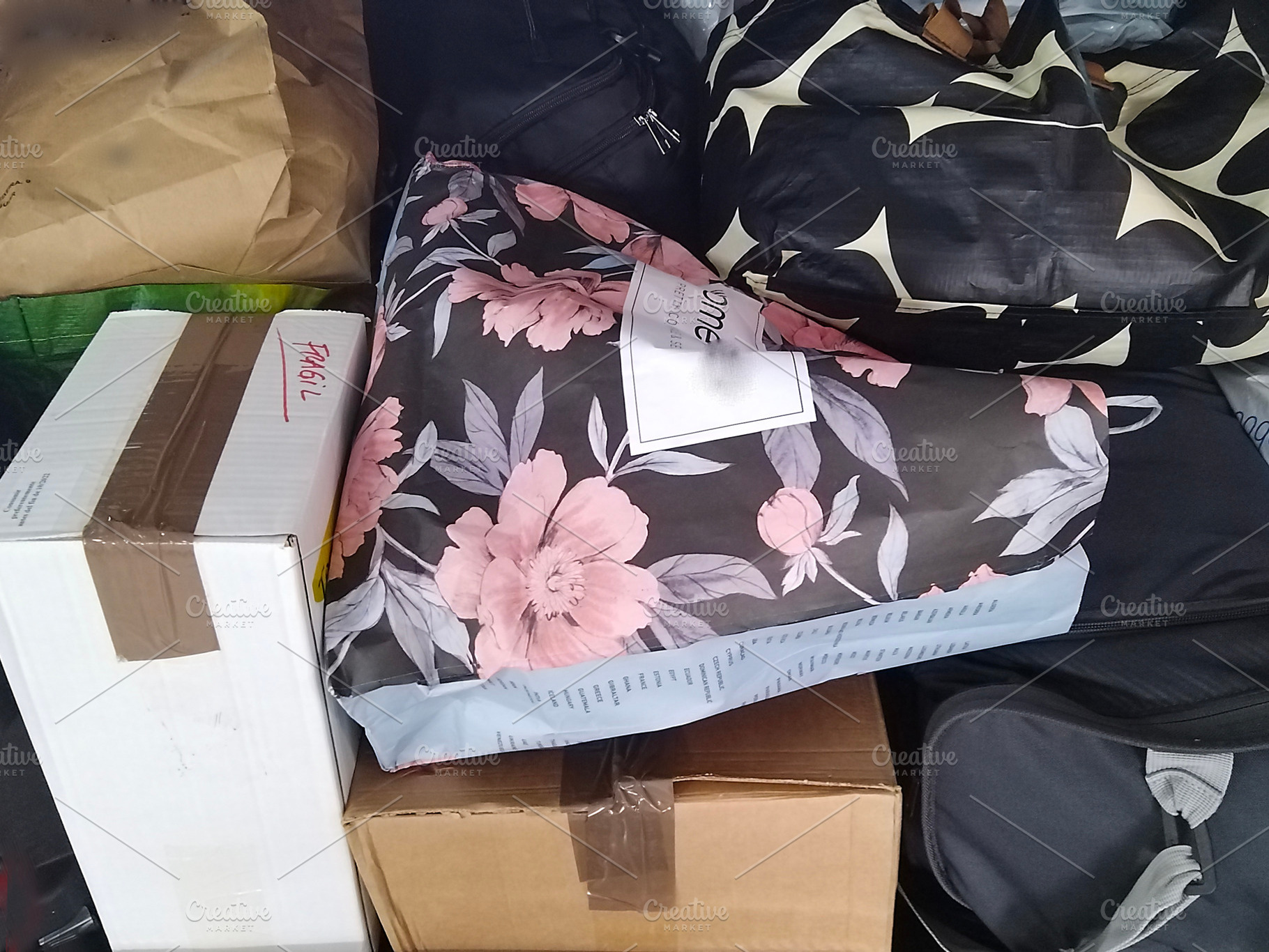 Car trunk filled with bags and packages, a Beauty & Fashion Photo by DanFLCreativo