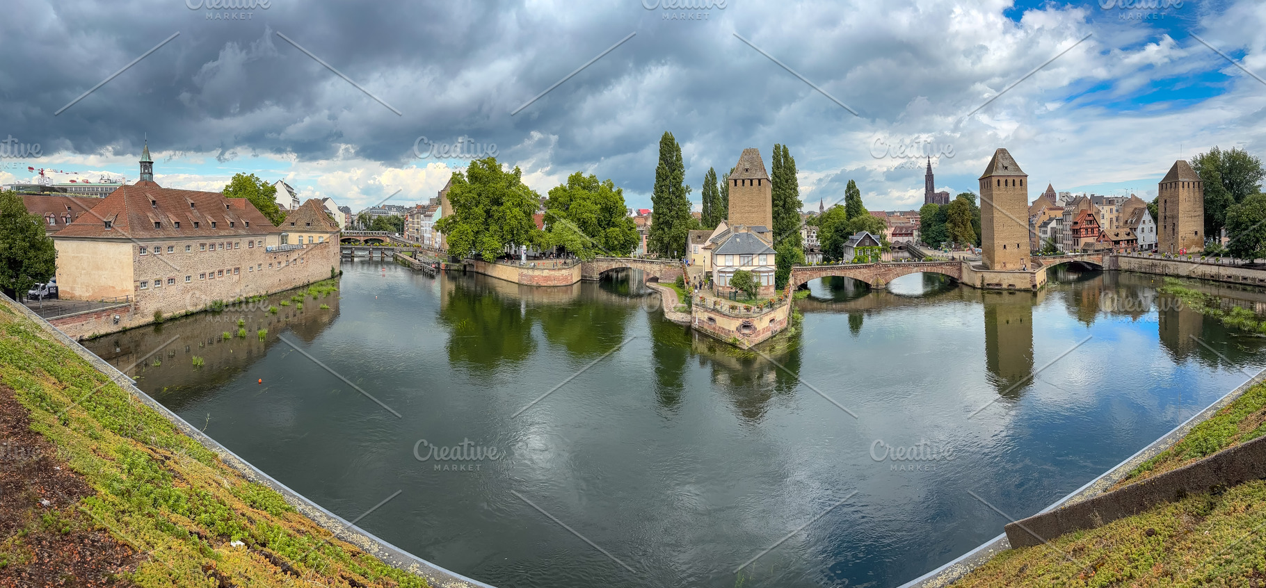 Panoramic view of Ponts Couverts towers and canal in Strasbourg, an Architecture Photo by GoodGoods