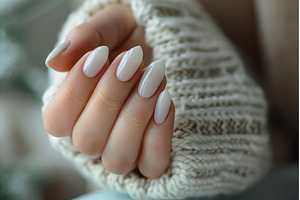 Woman showing white manicure on, a Beauty & Fashion Photo by Ylivdesign