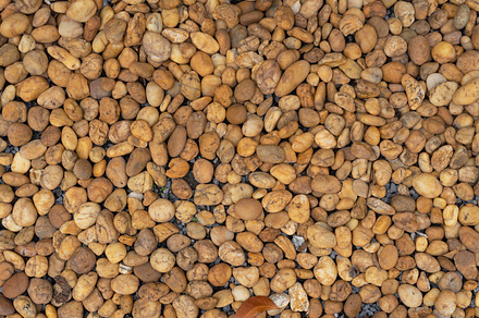 Granite gravel stone rocks flooring pattern surface texture. Clo, a Background Photo by Tampatra