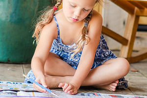 Girl doing an Art Project Outdoor
