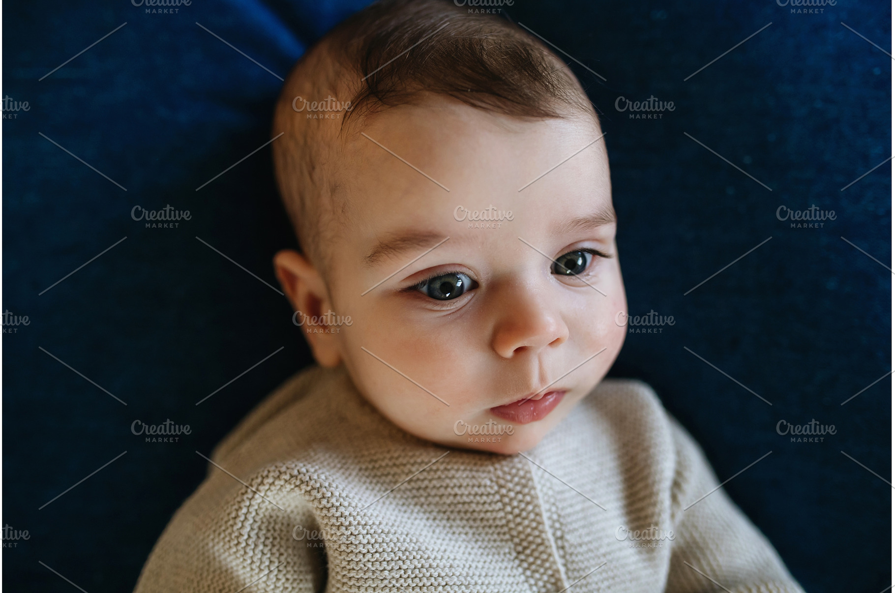 Portrait of baby boy, top view., a Person Photo by HalfPoint
