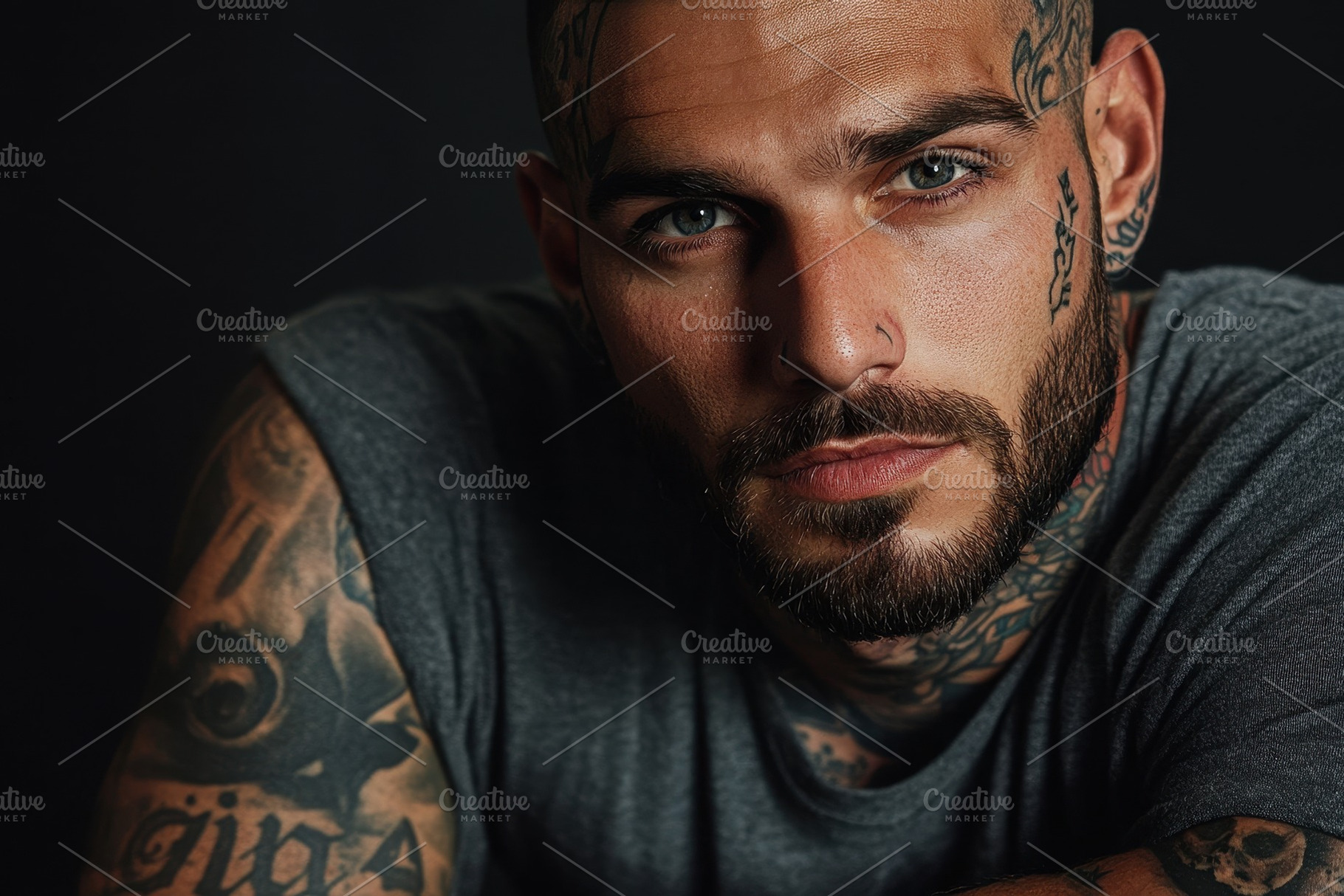 Man with tattoos poses dramatically, a Photo by Pavel_design