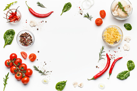 Colorful pizza ingredients on white, a Food & Drink Photo by Prostock-Studio