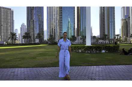 Happy woman in blue summer suit, a Person Photo by Media Whale Stock