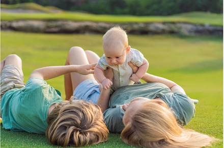 Mother, older son, and newborn baby
