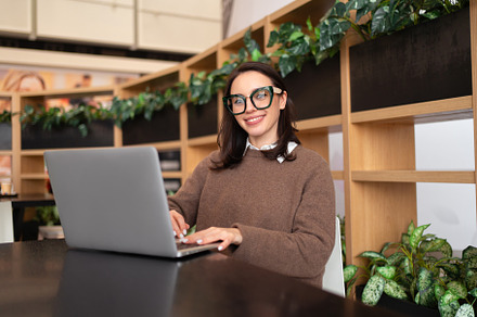Woman Wearing Glasses using Laptop, a Photo by andreonegin market