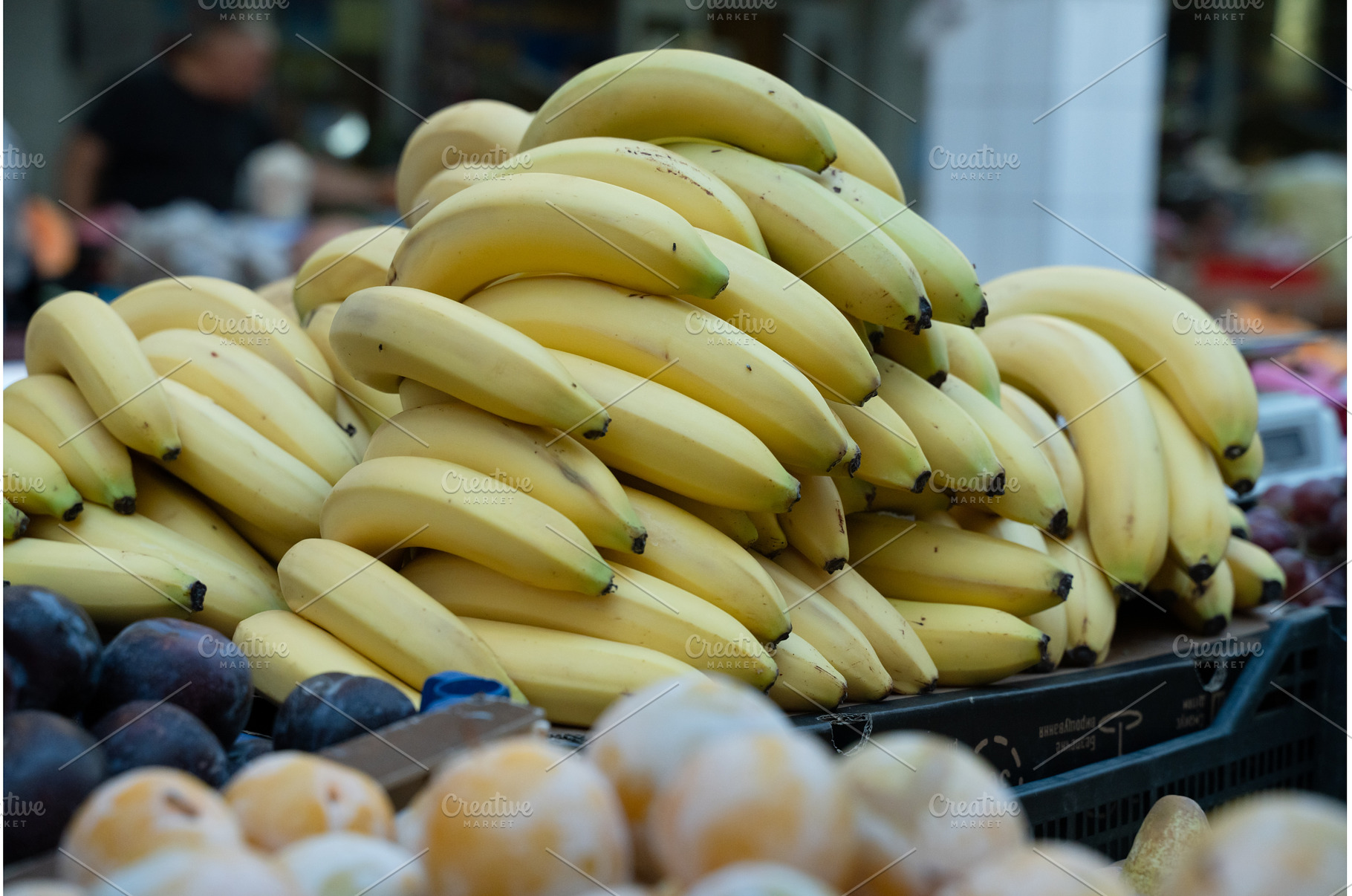 Fresh bananas in plastic boxes on, a Food & Drink Photo by oksix