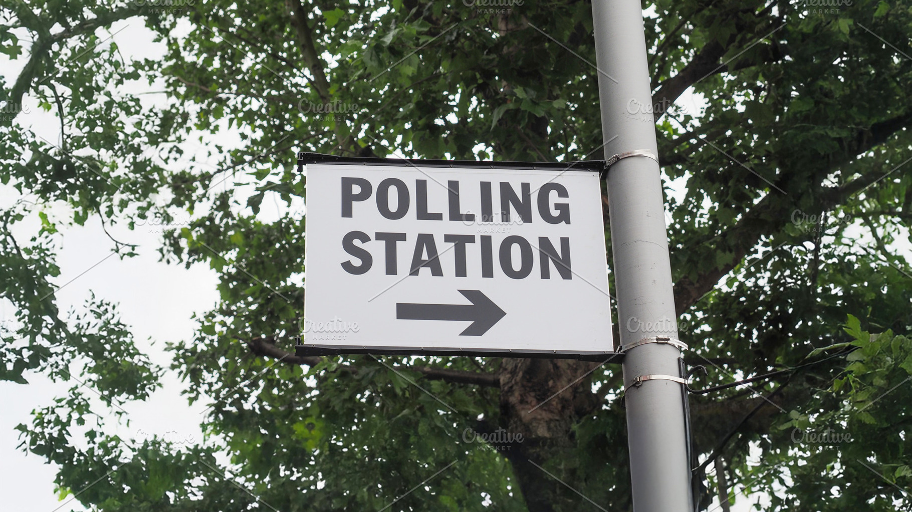 Polling station sign, a Photo by WorldOfPhotos