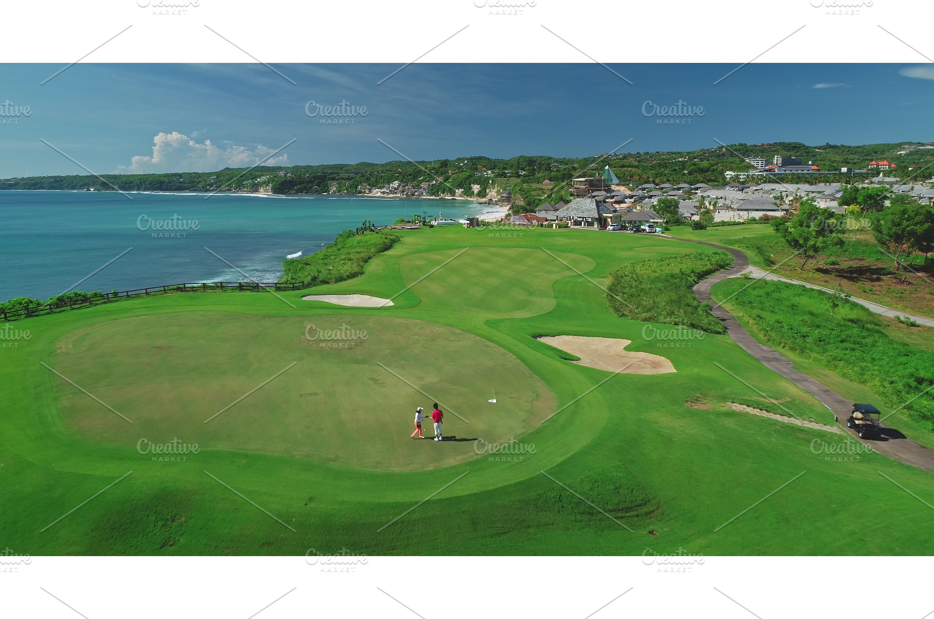 Golfers playing on beautiful green, a Nature Photo by Goinyk