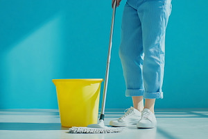 Cleaning an empty room with a mop, a Photo by Beautiful things