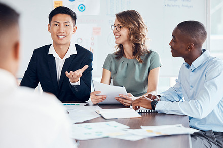 Office, team and meeting communication with question in boardroom with interracial finance staff. Cooperation, ideas and professional workforce discussion on financial work statistics documents., a Photo by Peopleimages.com