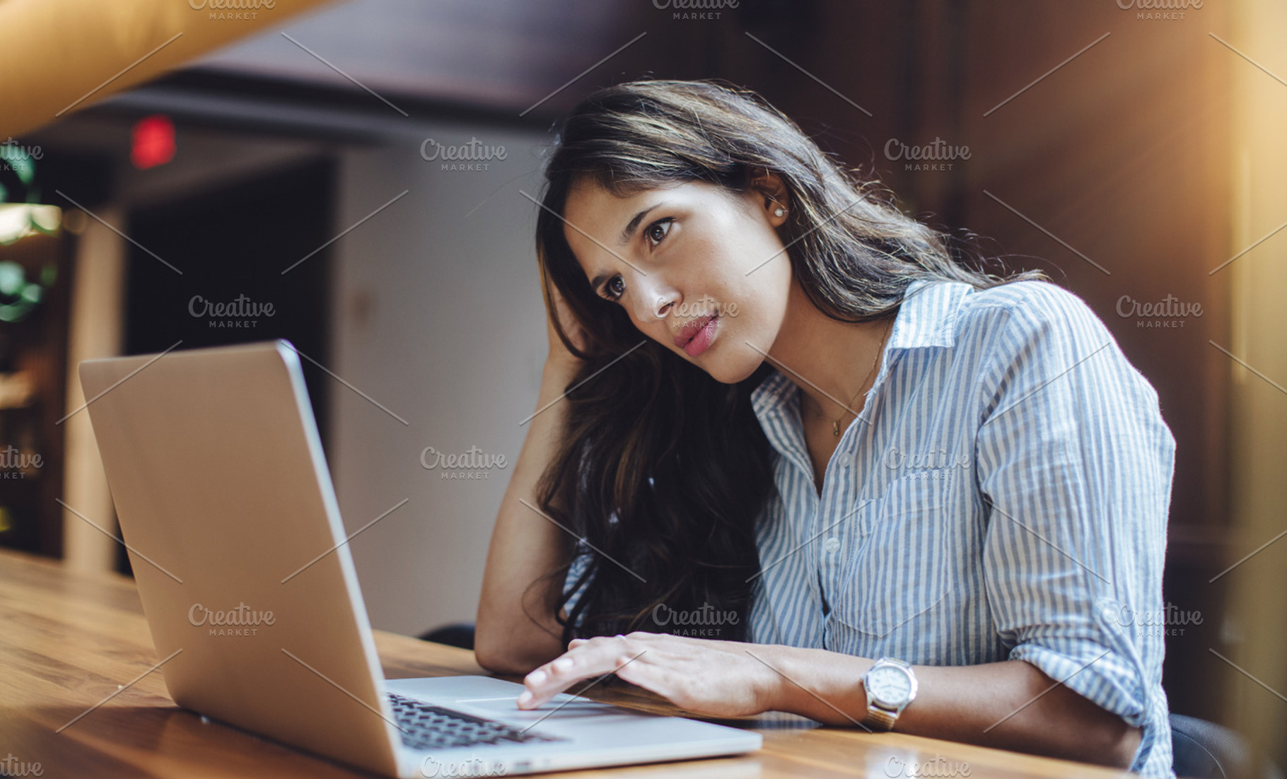 Business woman sitting by the table, a Person Photo by Anastasia Dudka