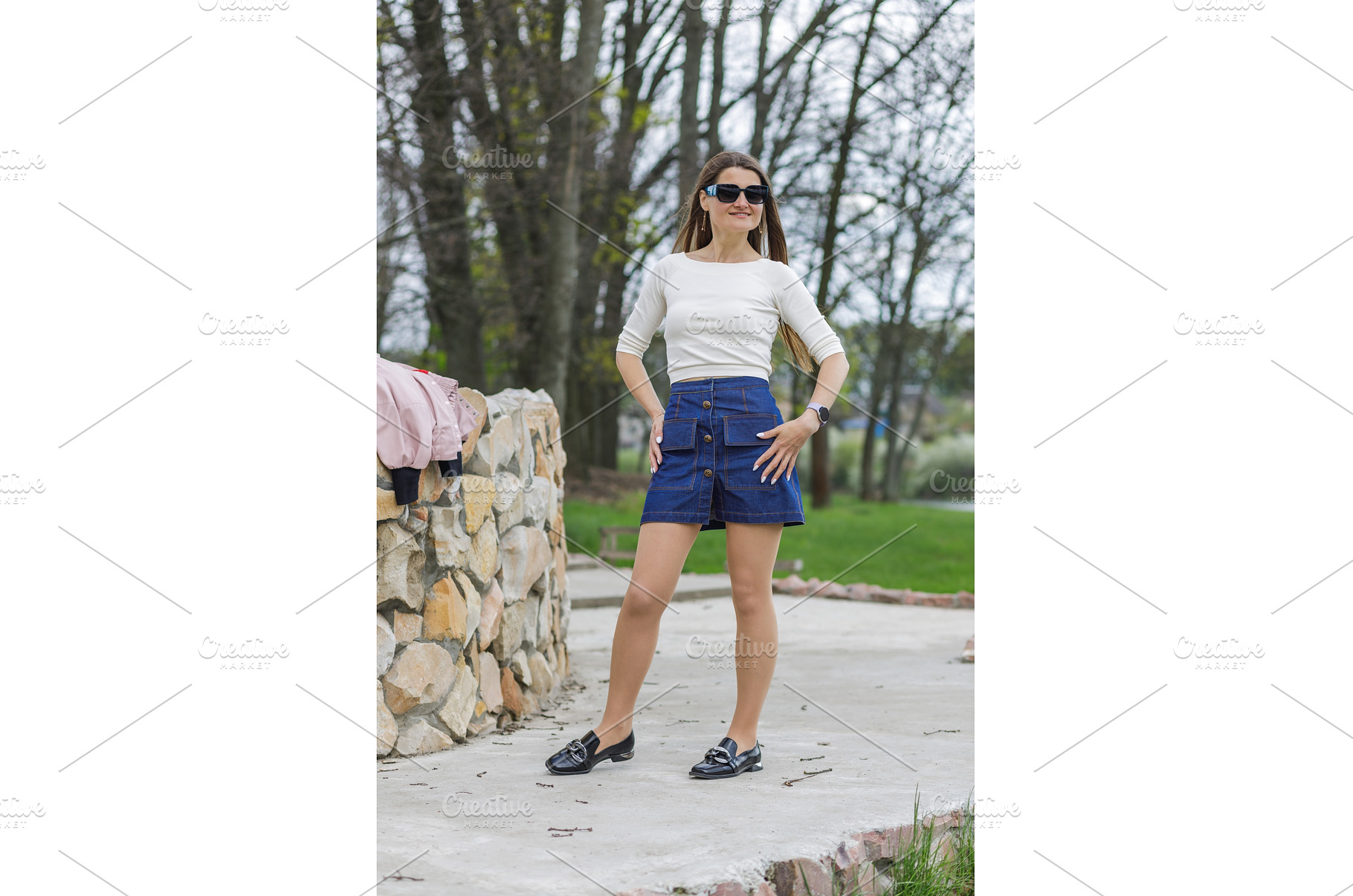 Young woman in short denim skirt and, a Person Photo by serkum
