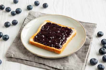 Healthy Blueberry Jelly and Toast on a Plate, side view., a Food & Drink Photo by LiudmylaChuhunova