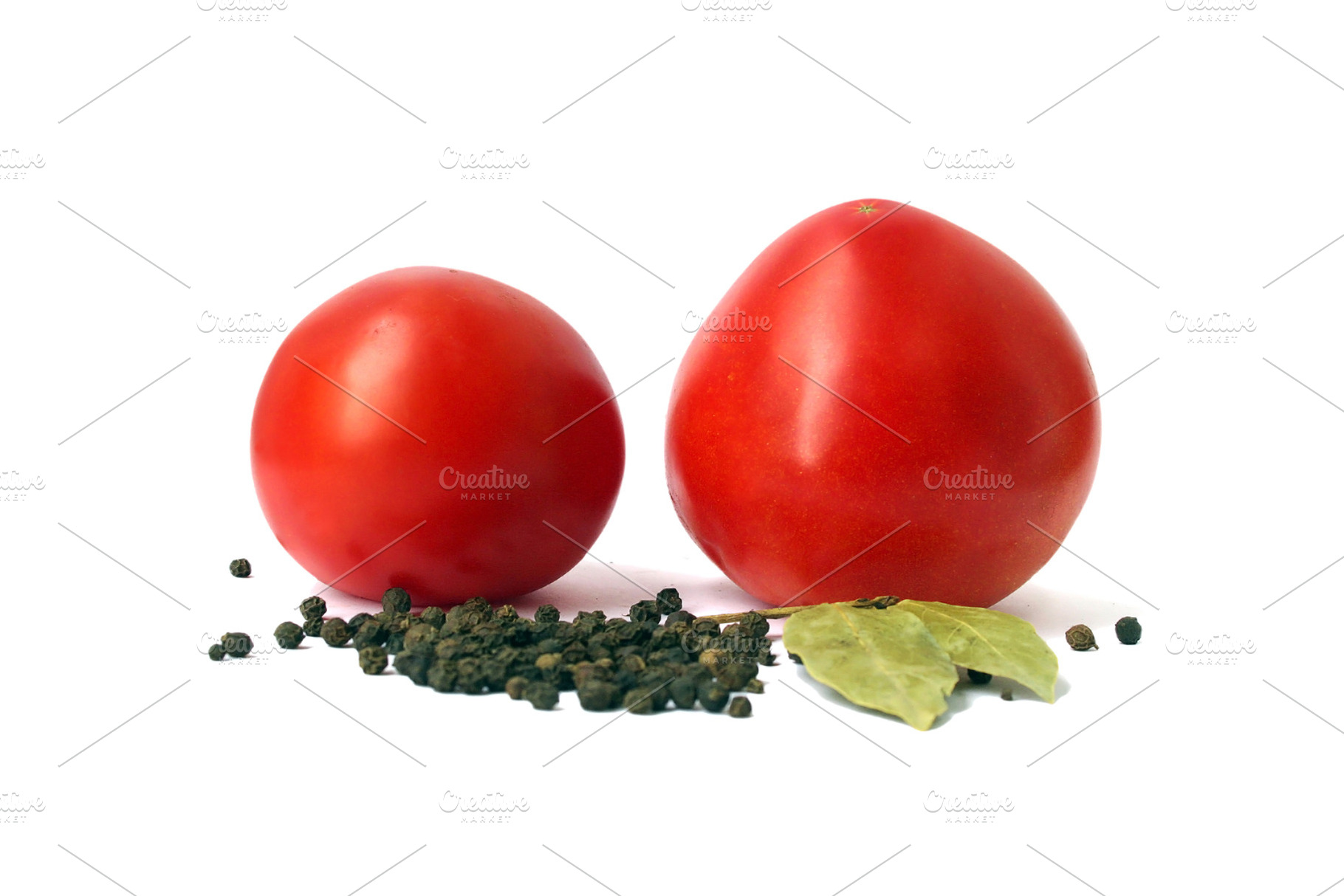 Two tomatoes and species, a Photo by saiko3p