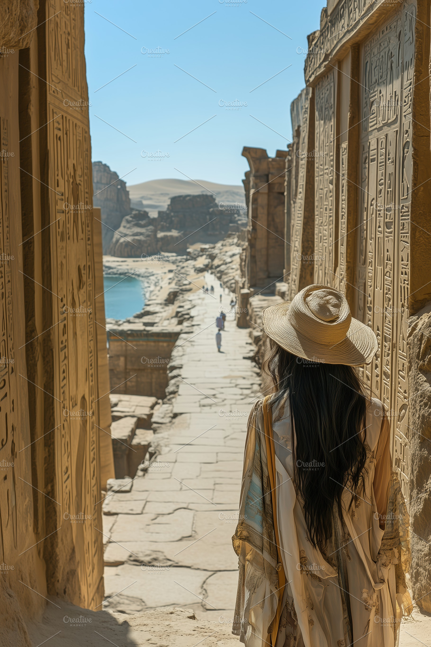 A woman Egyptologist in a wide-brimmed hat stands at the entrance of an ancient, a Person Photo by Textures & Backgrounds