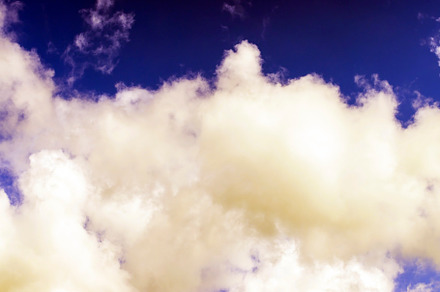 Blue sky with light clouds in windy weather, a Background Photo by MyPhotos